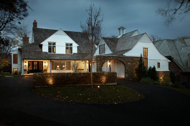 Stone Retaining Wall and Arch Create Elegant Front Facade | HGTV