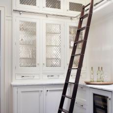 Ladder Adds Contrast and Accessibility to Neutral Farmhouse Kitchen