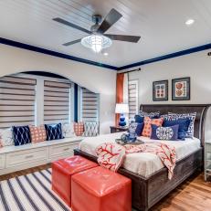 Navy and White Traditional Bedroom with Orange Accents