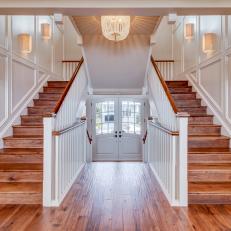 White, Traditional Entry with Dual Staircase