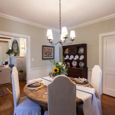 Gray Traditional Dining Room with Drop Cloth Chair Covers 