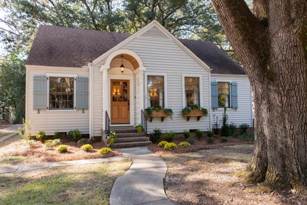 White Home Exterior with Blue Shutters 