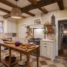Neutral French Country Kitchen with white Limestone Countertops  