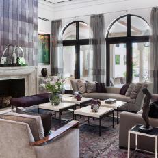 Purple Accents and Rich Fabrics Add Texture to Living Room