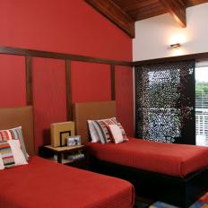 Bold, Red Anchors Bright Spare Bedroom Design