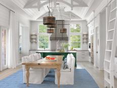 White Kitchen and Dining Room With Ladder