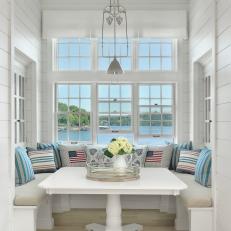 White Breakfast Nook With Americana Pillows