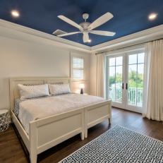 Blue and White Bedroom With Blue Ceiling