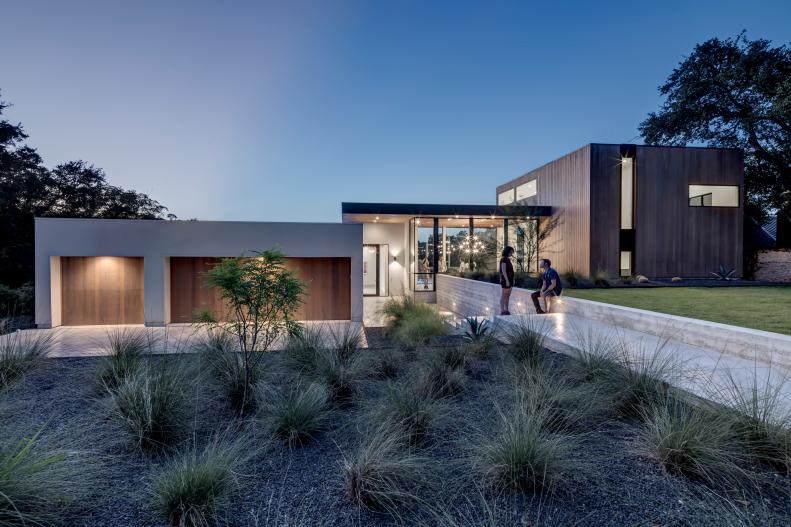 Home's Modern Facade Supported by Retaining Wall 