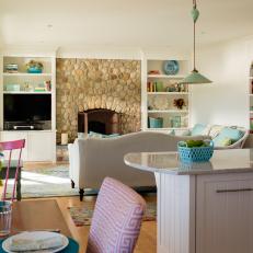 Living Room Showcases Fireplace and Stone Surround