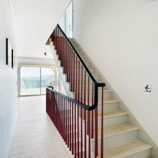 Rustic-Modern Staircase with Red and Black Details