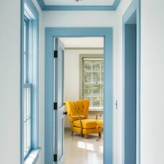 Rustic-Modern Hallway with Bold Blue Trim