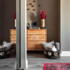 Master Bedroom Corner With Wood Dresser, Modern Decor and Basket Blanket Storage