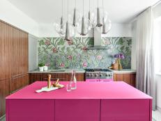 Contemporary Kitchen With Bright Pink Island