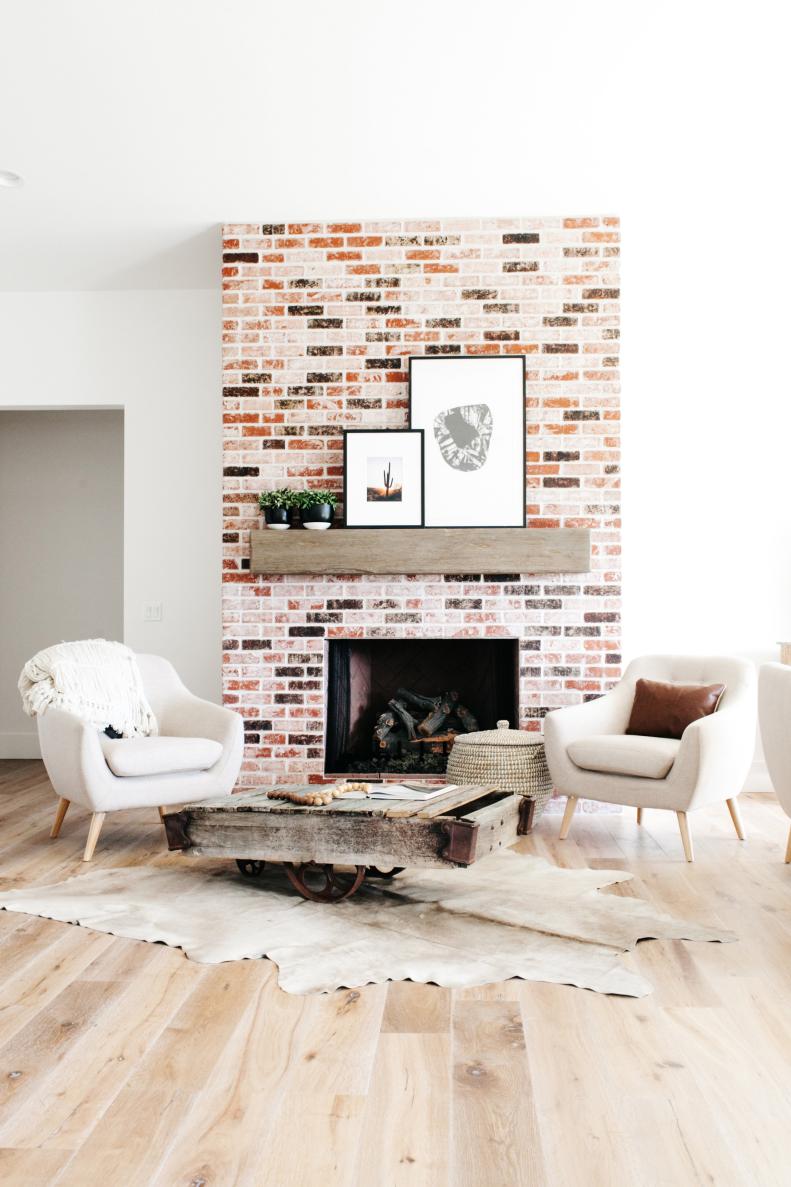 Bright Living Room With Brick Fireplace