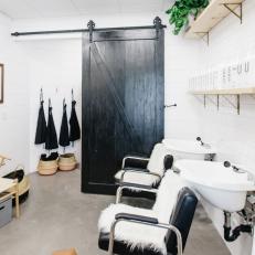 Black Barn Door Adds Contrast and a Private Employee Area