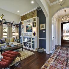 Eclectic Living room With Navy Blue Walls and Foyer