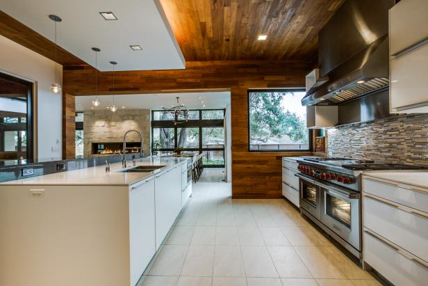 High-End Kitchen With Wood Ceiling and Large Island