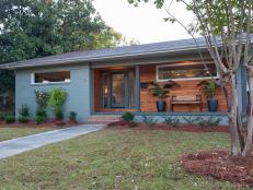 Blue Mid-century Modern Home with Glass Door 