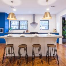 Blue Midcentury Modern Kitchen with White Kitchen Island 