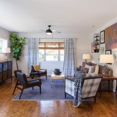 Blue Mid-century Modern Living Room with Neutral Hardwood Floors 