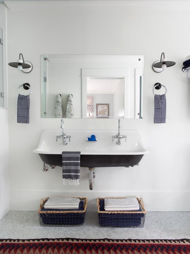 storage under open bathroom sink