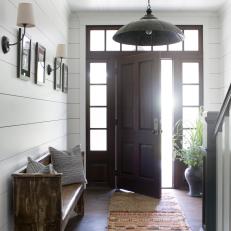 Timeless Wooden Farmhouse Front Door with Window Framing 