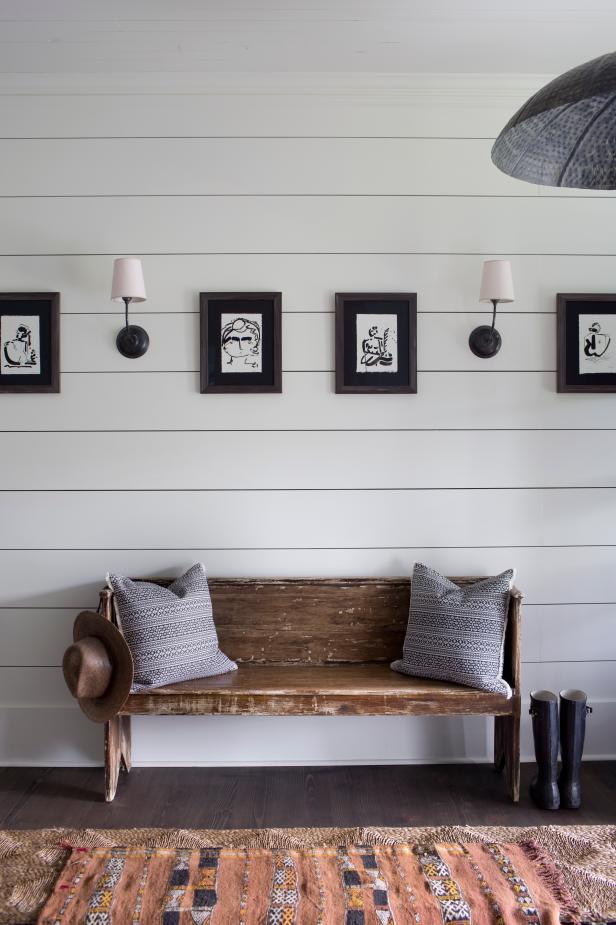 Distressed Natural Wood Bench Over White Shiplap Wall With Black Distressed Natural Wood Bench Over
