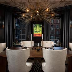 Black Midcentury Modern Dining Room With Face Artwork