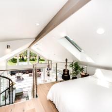 Open Loft Bedroom with a View of the Lower Level