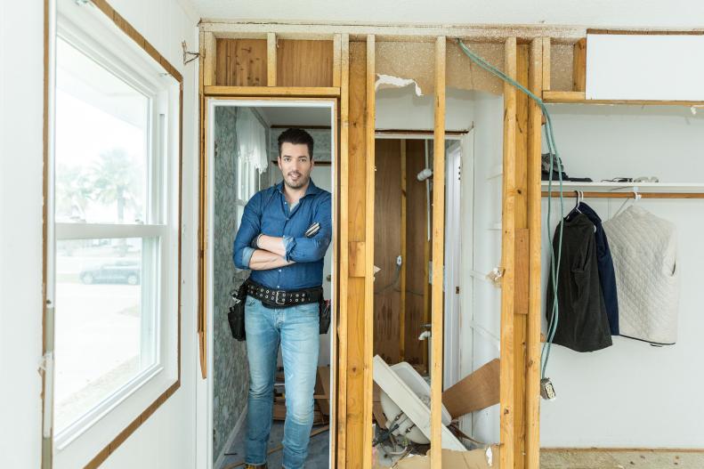 Host Jonathan Scott pauses for a moment in the bathroom, as seen on Brother vs. Brother.