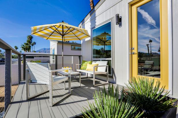 Contemporary Deck With Sleek Furniture, Striped Umbrella