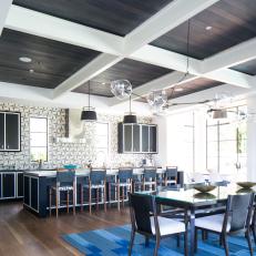 Open Kitchen & Dining Room With Blue Rug
