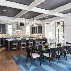 Contemporary Kitchen and Dining Room With Blue Rug