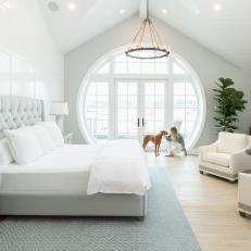 White Contemporary Bedroom With Round Windows