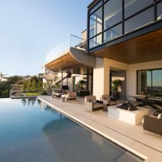 Contemporary Covered Patio With Eye-Catching Infinity Pool