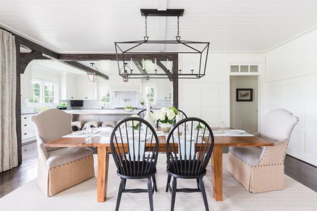 Transitional Dining Room With Black Chairs