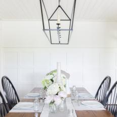 White Country Dining Room With Black Chairs