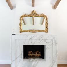 Marble Fireplace and Gold Mirror