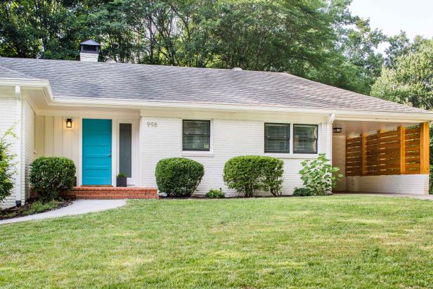 Exterior: Mid-Century Modern Home With Blue Door.