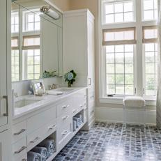 Master Bathroom Features Marble Floor With Intricate Tile Pattern