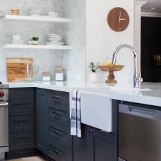 Mid-Century Modern Kitchen With Dark Blue Peninsula