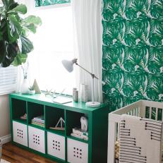 Green and White Tropical Nursery With Wallpaper