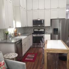 Contemporary White Kitchen with Gray Stone Countertops 