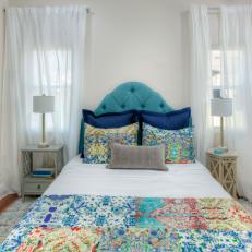 Contemporary Neutral Guest Bedroom with Blue Headboard