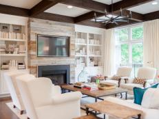 Neutral Transitional Living Room With Wood Beam Fireplace