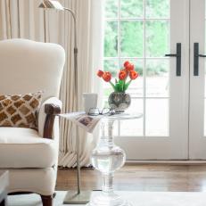 Clear End Table and White Armchair