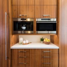 Sleek Woodgrain Kitchen Cabinetry, Built in Espresso Station and White Cabinetry 