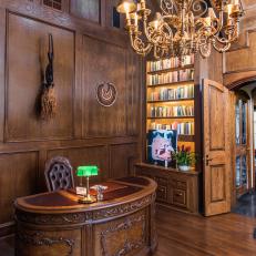 Private Office and Library With Built In Bookshelves, Lamp Chandelier and Stately Traditional Desk
