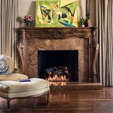 Living Room With Grand, Traditional Fireplace and Contemporary Details 